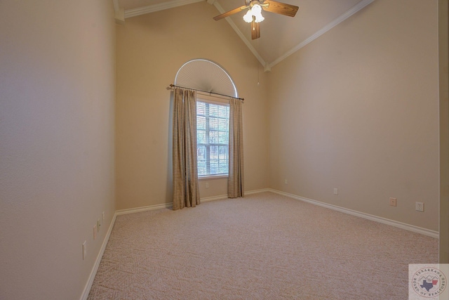 carpeted empty room with ceiling fan, crown molding, and vaulted ceiling