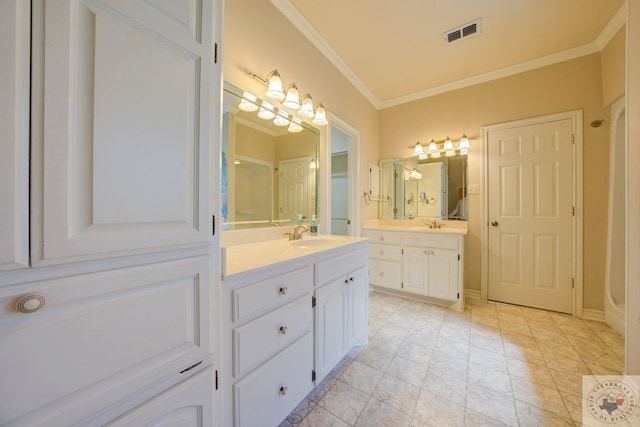 bathroom featuring vanity and ornamental molding