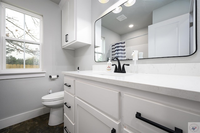 bathroom featuring vanity, toilet, concrete floors, and a shower with curtain