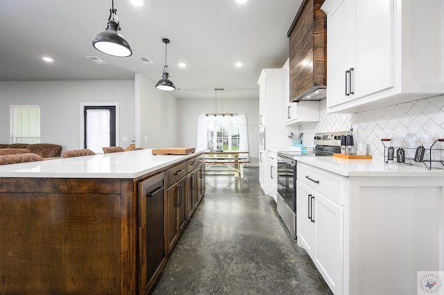 kitchen with custom exhaust hood, white cabinetry, dark brown cabinetry, decorative light fixtures, and electric stove