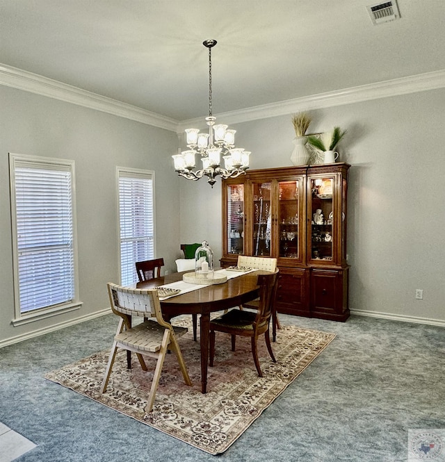 dining area with a chandelier, carpet, and ornamental molding