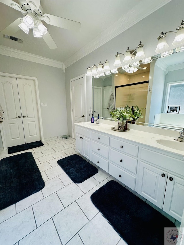 bathroom featuring tile patterned floors, vanity, walk in shower, ornamental molding, and ceiling fan