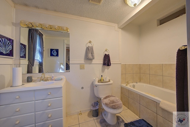 bathroom with tile patterned floors, toilet, a textured ceiling, a relaxing tiled tub, and vanity