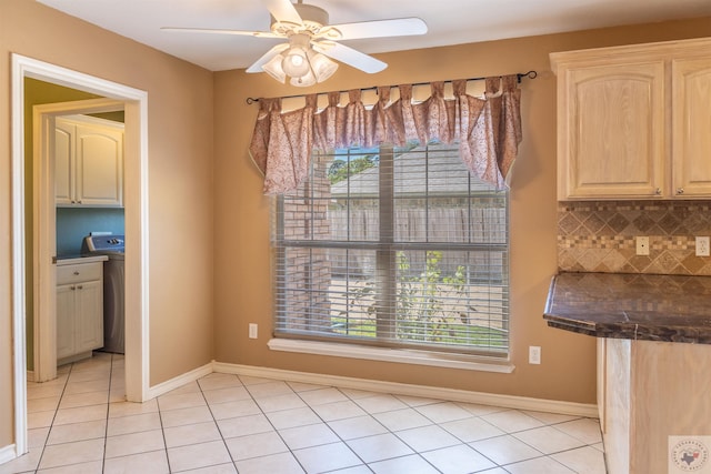 unfurnished dining area with ceiling fan, a healthy amount of sunlight, and light tile patterned flooring