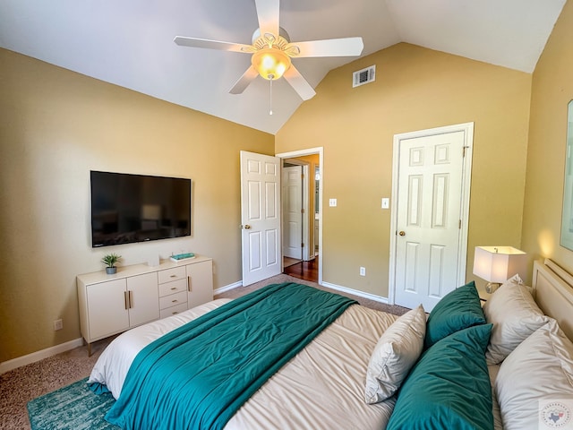 bedroom with ceiling fan, carpet, and vaulted ceiling