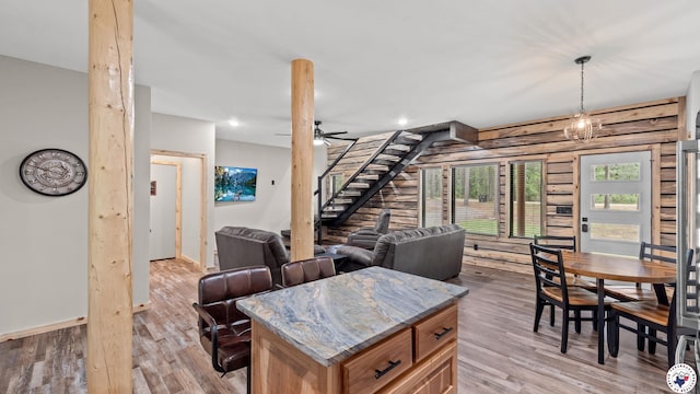 228 Old Factory Site Rd, Murfreesboro, AR 71958 - dining room with light wood-style floors, a ceiling fan, stairs, baseboards, and recessed lighting