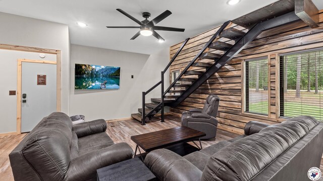 228 Old Factory Site Rd, Murfreesboro, AR 71958 - living room featuring wood finished floors, stairs, ceiling fan, baseboards, and recessed lighting