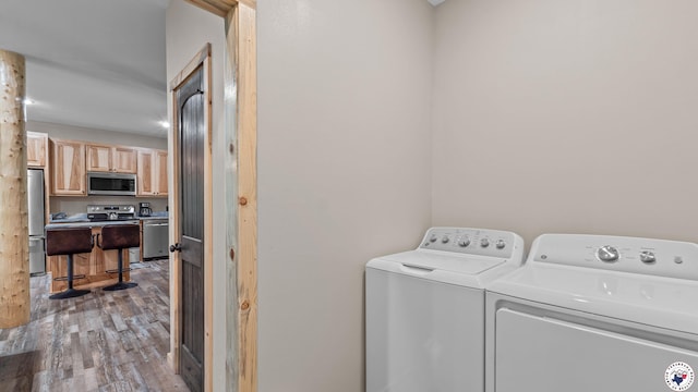 228 Old Factory Site Rd, Murfreesboro, AR 71958 - washroom with independent washer and dryer and wood finished floors