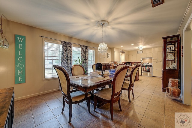 dining space with light tile patterned floors