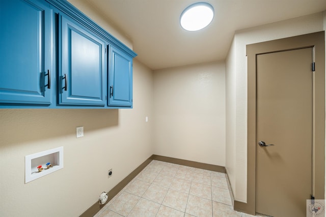 laundry room with hookup for a washing machine, cabinet space, hookup for an electric dryer, light tile patterned flooring, and baseboards