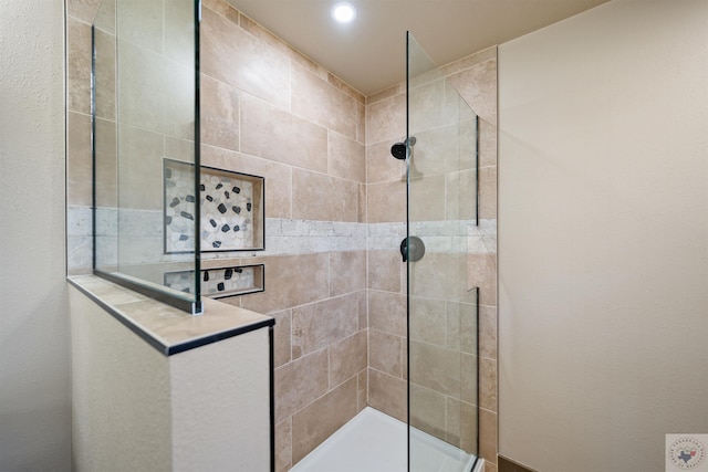 full bath with walk in shower and recessed lighting