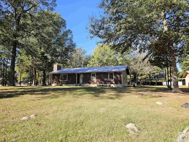 7823 Texas Highway 8, Douglassville, TX 75560 - view of front facade with a front yard