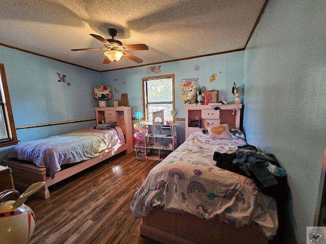 bedroom featuring ceiling fan, crown molding, dark wood-type flooring, and a textured ceiling