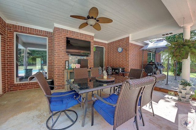 view of patio / terrace with ceiling fan