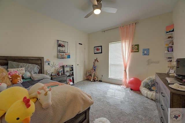 carpeted bedroom with ceiling fan