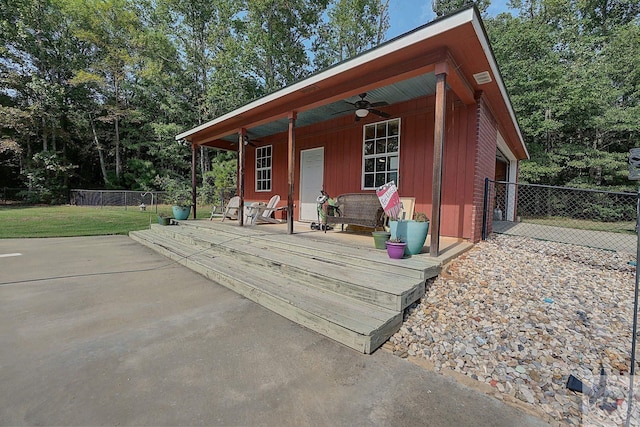 view of outbuilding featuring a lawn