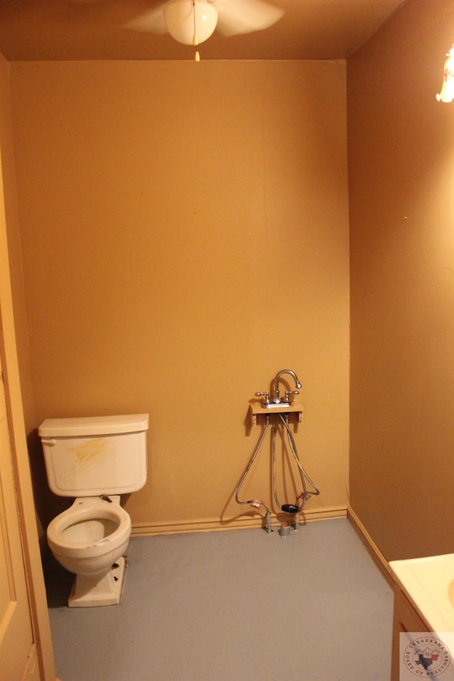 bathroom featuring toilet