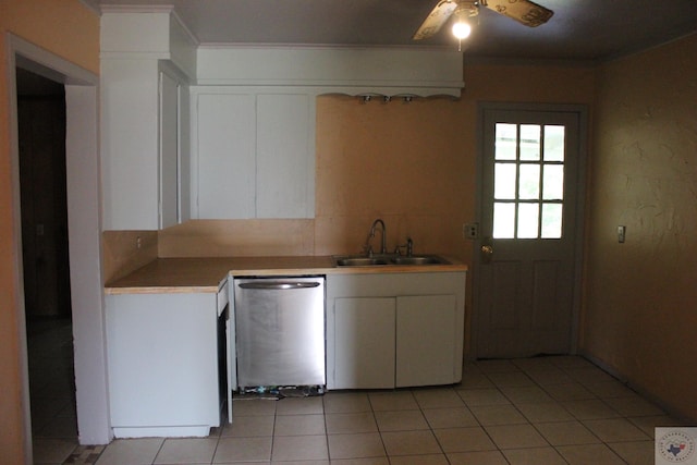 kitchen with dishwasher, white cabinetry, light tile patterned floors, sink, and ceiling fan