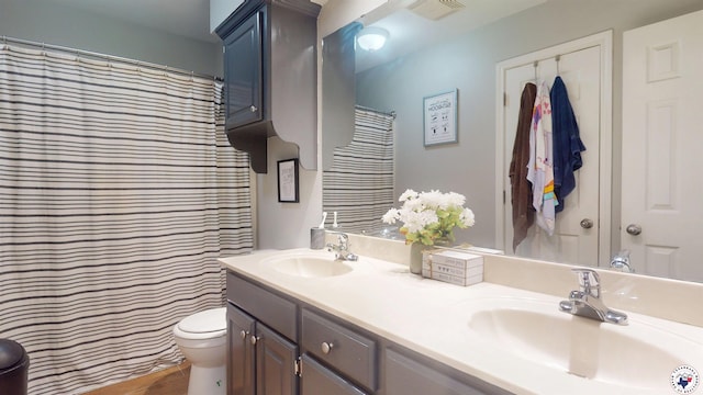 142 Corley Cir, Wake Village, TX 75501 - full bathroom with double vanity and toilet