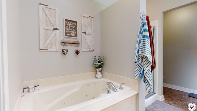 142 Corley Cir, Wake Village, TX 75501 - bathroom with a tub with jets and a stall shower