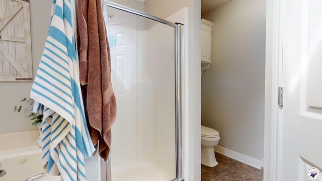 142 Corley Cir, Wake Village, TX 75501 - bathroom featuring a stall shower, toilet, baseboards, tile patterned flooring, and a tub