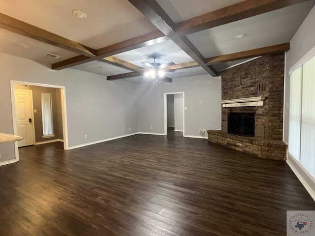 unfurnished living room featuring a fireplace, coffered ceiling, beamed ceiling, and dark hardwood / wood-style flooring