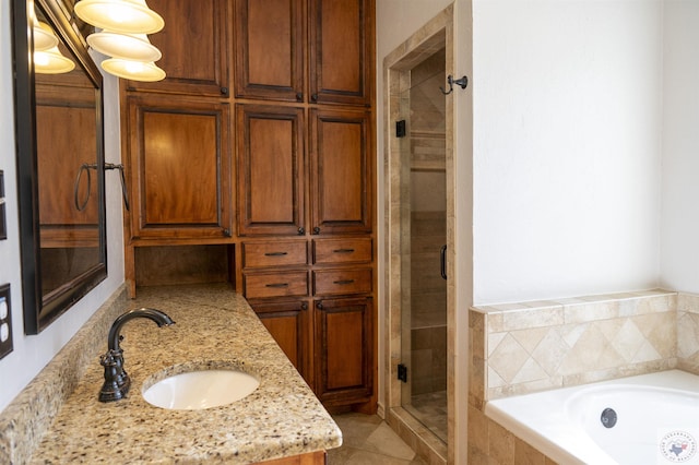 bathroom with separate shower and tub and vanity