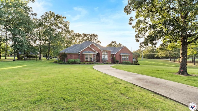 6616 Lakeridge Dr, Texarkana, TX 75503 - view of front facade featuring a front lawn and brick siding