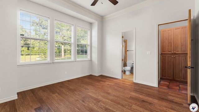 6616 Lakeridge Dr, Texarkana, TX 75503 - unfurnished bedroom featuring crown molding, dark wood finished floors, ensuite bath, and ceiling fan