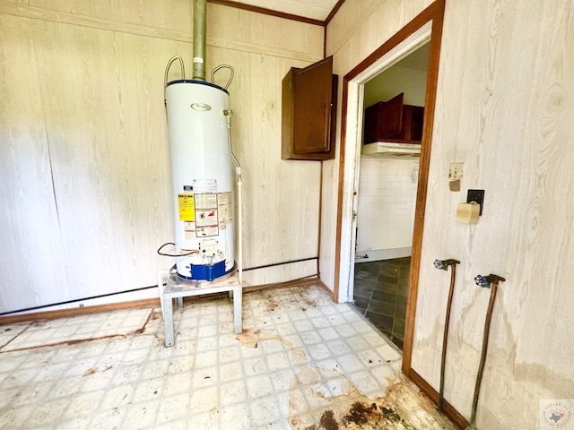 utility room with water heater