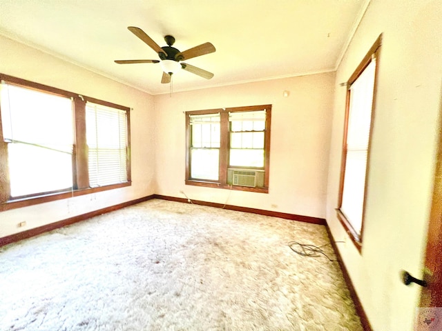 unfurnished room with crown molding, cooling unit, and ceiling fan