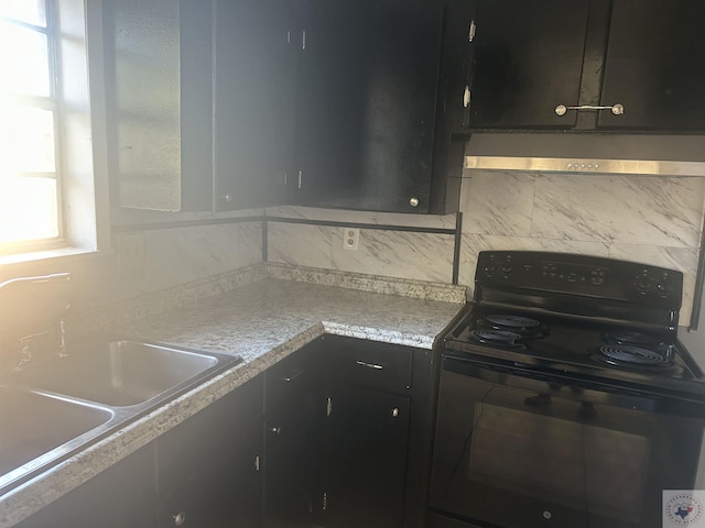 kitchen with sink and black electric range oven