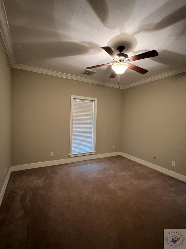 unfurnished room featuring crown molding, dark colored carpet, and ceiling fan