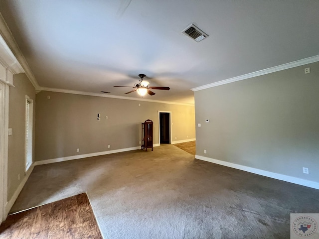 carpeted empty room with ceiling fan and ornamental molding