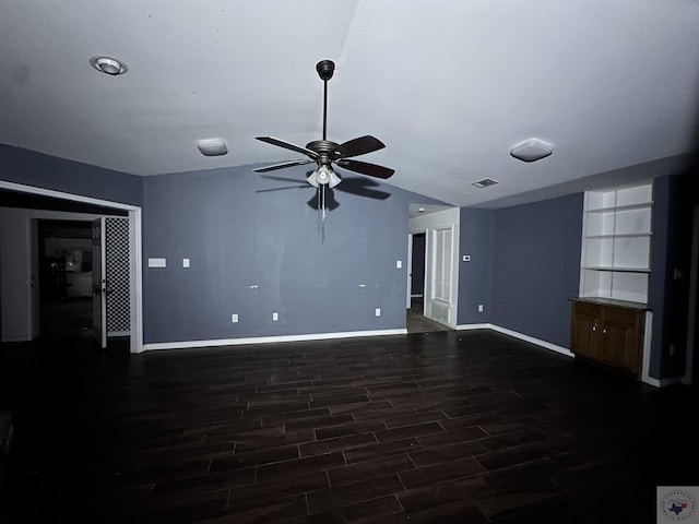 unfurnished living room with ceiling fan, lofted ceiling, and dark hardwood / wood-style flooring