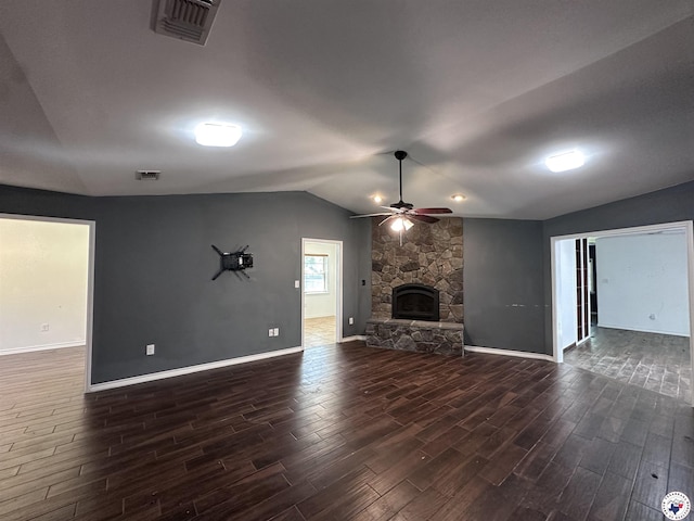 5611 Larry Dr, Texarkana, TX 75503 - unfurnished living room featuring a fireplace, dark wood finished floors, a ceiling fan, visible vents, and lofted ceiling