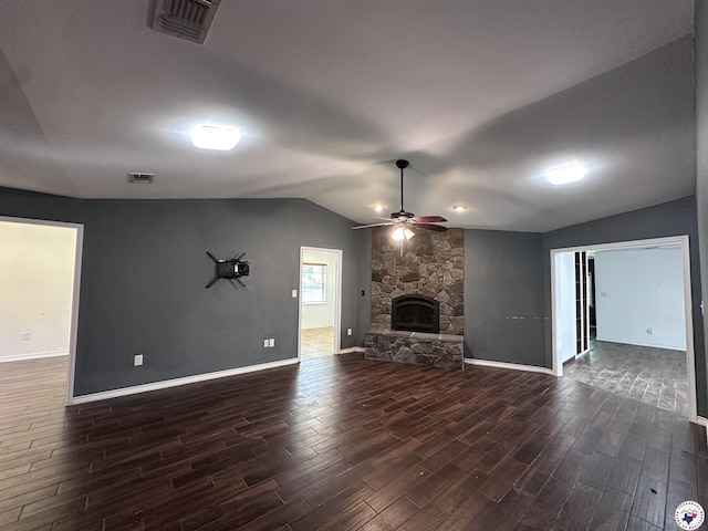 5611 Larry Dr, Texarkana, TX 75503 - unfurnished living room featuring visible vents, a ceiling fan, a fireplace, dark wood finished floors, and lofted ceiling