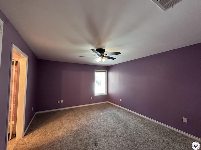 5611 Larry Dr, Texarkana, TX 75503 - carpeted empty room with visible vents, baseboards, and a ceiling fan