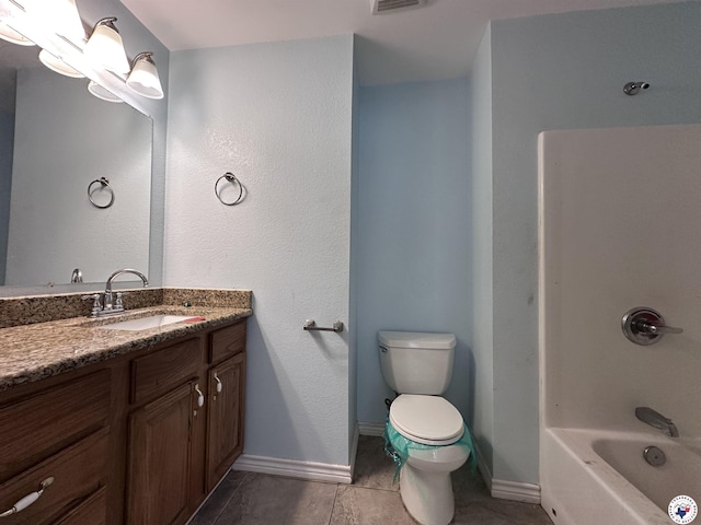 5611 Larry Dr, Texarkana, TX 75503 - full bath with visible vents, baseboards, toilet, vanity, and tile patterned floors