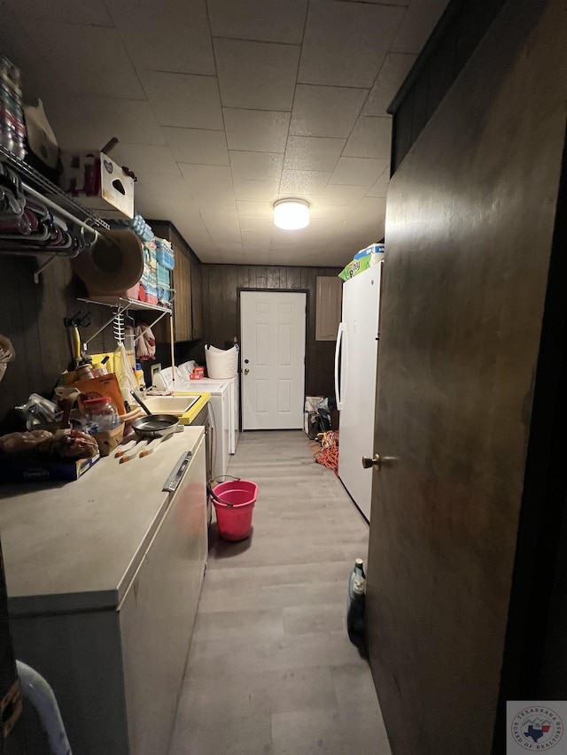 washroom featuring light hardwood / wood-style flooring and independent washer and dryer