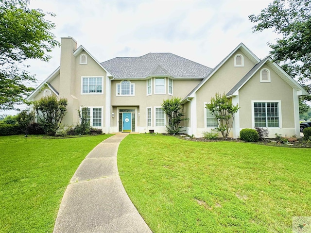 view of front of home featuring a front lawn