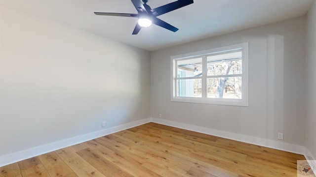 unfurnished room featuring light hardwood / wood-style flooring and ceiling fan