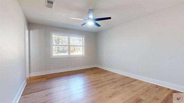 unfurnished room featuring ceiling fan and light hardwood / wood-style flooring