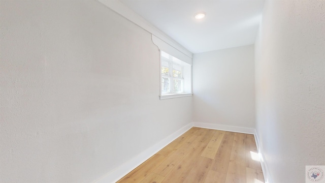 unfurnished room featuring light hardwood / wood-style floors