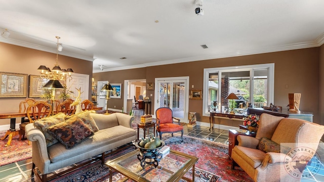 living room with tile patterned floors, crown molding, and an inviting chandelier