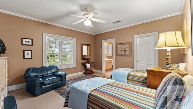 bedroom featuring crown molding, light carpet, ensuite bath, and ceiling fan