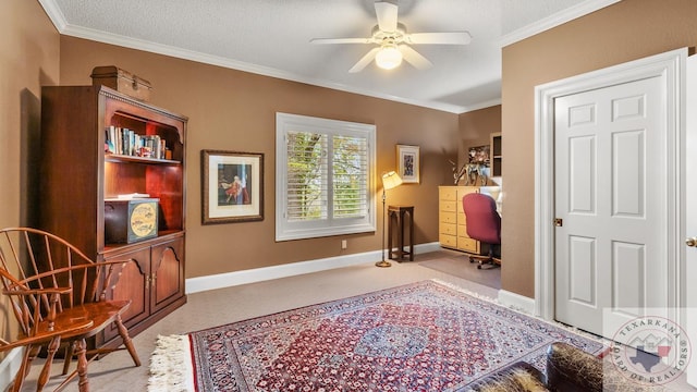 living area featuring ceiling fan, light colored carpet, a textured ceiling, and ornamental molding