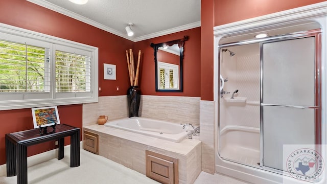 full bath with a textured ceiling, a stall shower, a garden tub, and crown molding