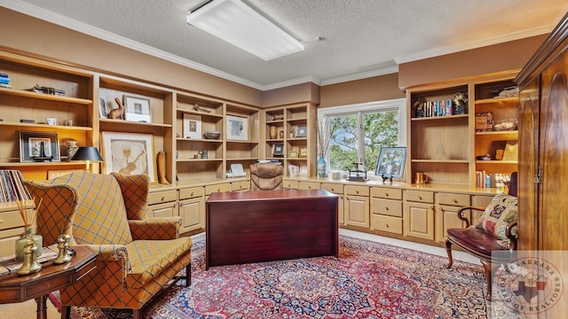 living area featuring built in desk, ornamental molding, and a textured ceiling