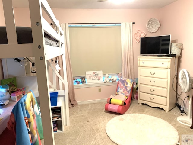 bedroom with light colored carpet